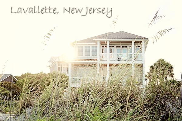 Homes for sale in Lavallette showing a beach home surrounded by beach grass with Lavallette, New Jersey written in Italic script at top of photo